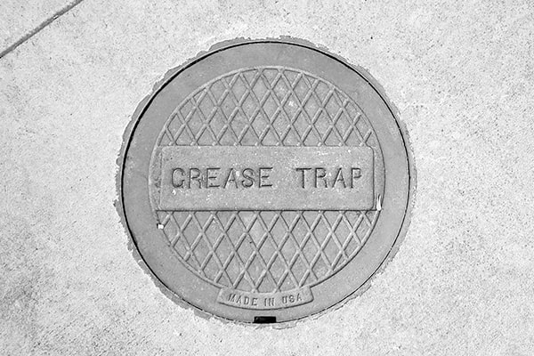 many municipalities have regulations requiring regular grease trap pumping to prevent grease from entering the sewer system